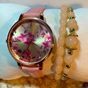 NWOT- Rose gold tone Floral watch with matching bracelets